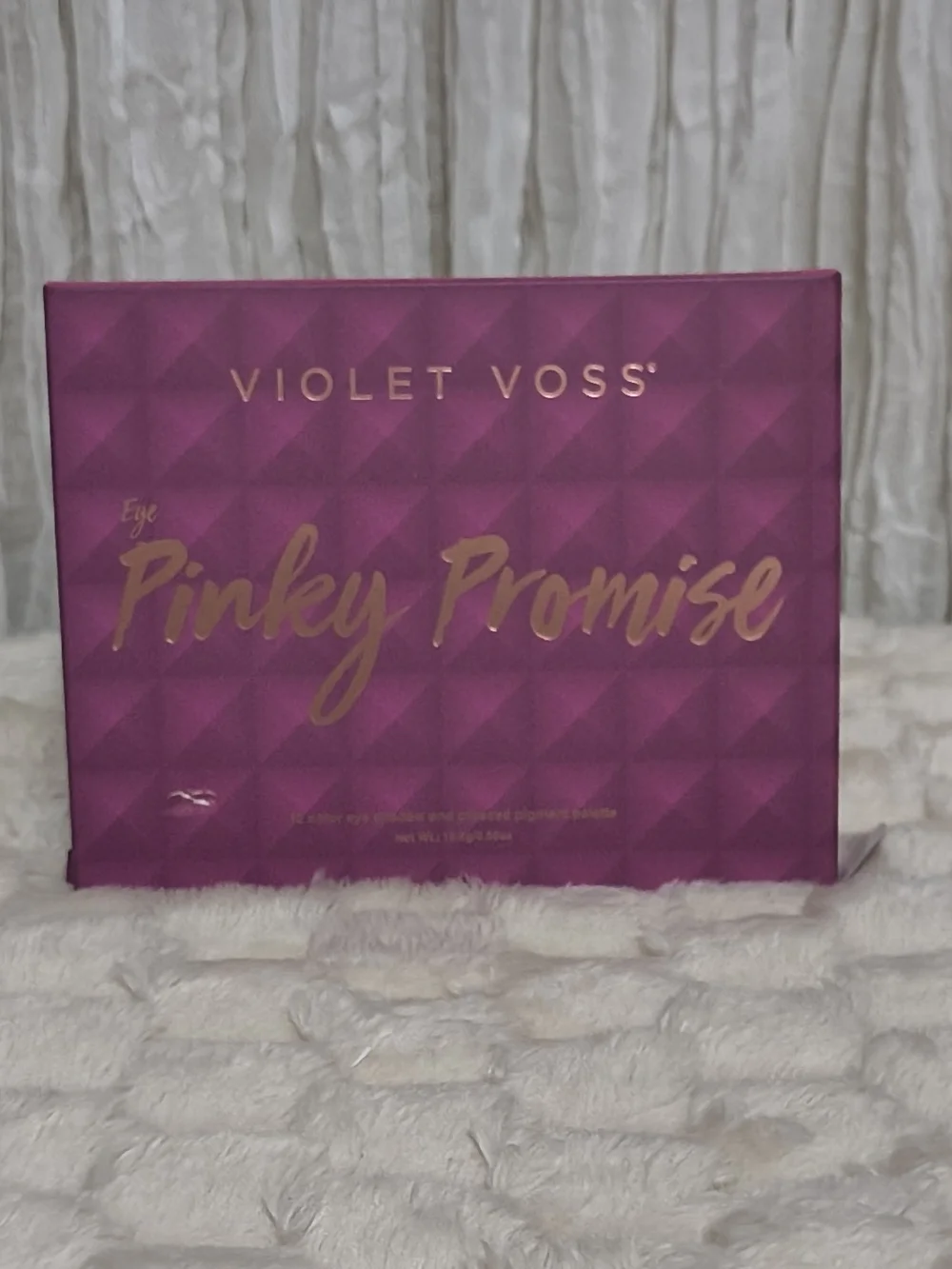 Pinky Promise boxed product on textured surface